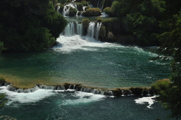 Waterfalls in Krka National Park in Croatia. Strength and picturesque miracle of nature