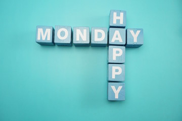 Happy Monday alphabet letters with space copy on blue background