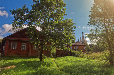 Russian old village in summer. Wooden houses