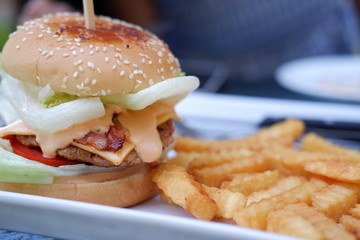 cheeseburger on table