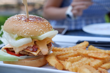 cheeseburger on table