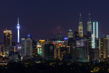 Night view over Kuala Lumpur, capital of Malaysia. Its modern skyline is dominated by the 451m tall KLCC, a pair of glass and steel clad skyscrapers.
