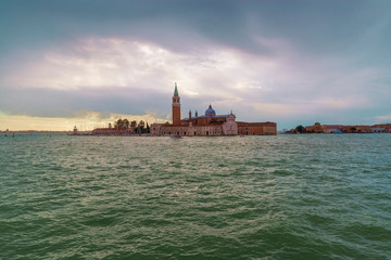 Fototapeta na wymiar VENICE, ITALY- OCTOBER 30, 2018: Church of San Giorgio Maggiore. Set on an island, an art-filled, bright white church by Palladio giving Venice views from its tower.