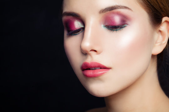 Glamorous Woman With Pink Eyeshadow Makeup On Black