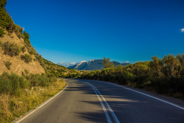 empty car road in beautiful mountain scenery environment landscape and background in good clear weather time