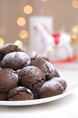 Homemade chocolate cookies with christmas background