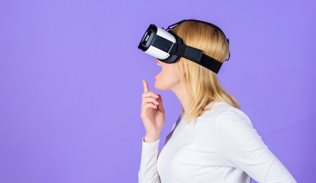 Digital device and modern opportunities. Woman head mounted display violet background. Virtual reality and future technologies. Girl use modern technology vr headset. Interact alternative reality