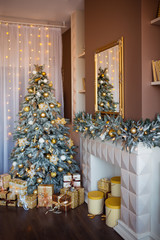 Christmas background. Luxury interior room with fireplace decorated in xmas style. No people. New year tree and gifts