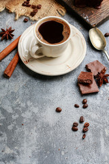 Cup of coffee on grey stone background.