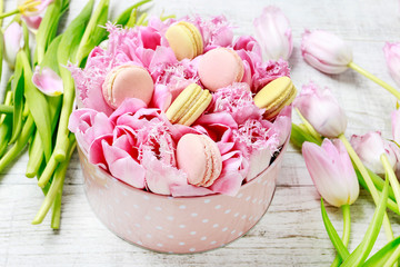 Dotted pink box with tulips and parisian macaroons.