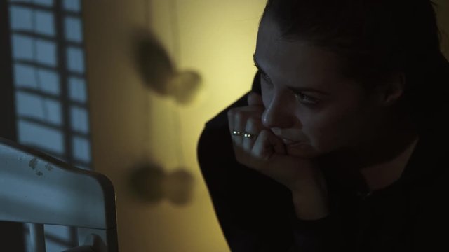 Young miserable woman thinkning about her future