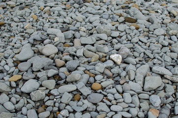 Background photograph of some stones of a Menorca beach.
