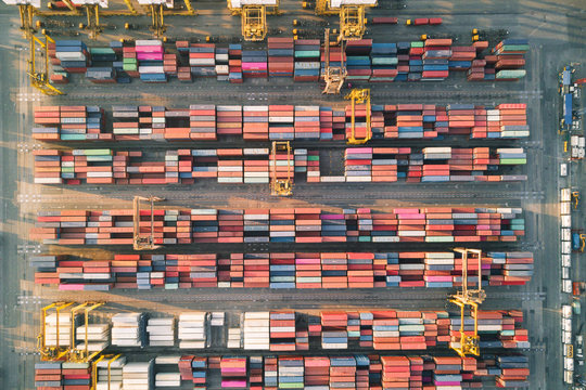 Shipping cargo commercial logistics industry Aerial top view of huge industrial port with containers. Global trade networks