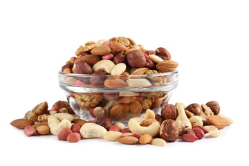 bowl with different mixed nuts isolated on white background