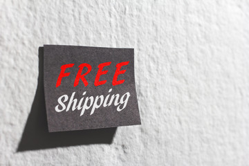 Black friday shopping sale. Post it reminder on wall.