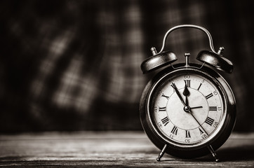 Retro alarm clock. Image in black and white color style