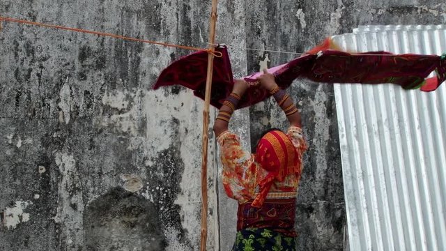 Indigenous Guna hangs molas  in the San Blas Islands