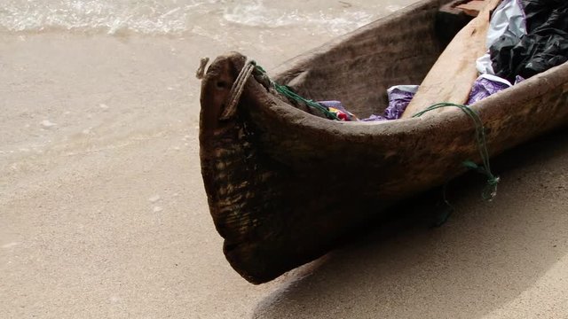 Indigenous Guna canoe on beach  in the San Blas Islands 
