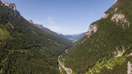 Fototapeta na wymiar Aerial view of mountain range with snow in the alpine mountains