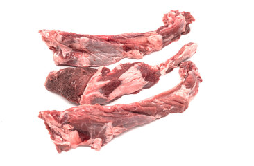 Raw ribs with meat on a white background