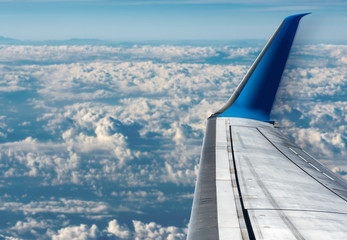 Commercial Airplane - Flying above the Clouds