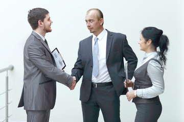 close up.businessman handshake with business woman. the concept of cooperation