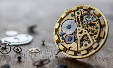 Watchmaker is repairing the mechanical watches in his workshop