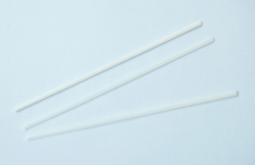 plastic drinking straw arranging on white background