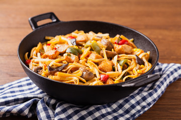Indonesian pasta with chicken, pieces of bamboo and mushrooms.