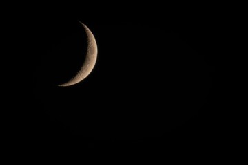 Obraz na płótnie Canvas moon, cresent, crescent, lunar, sky, night, astronomy, crater, waxing, visible, black, space, shadow, stars, quarter, star, surface, calendar, orbit, distant, phase, brighter, bright, craters