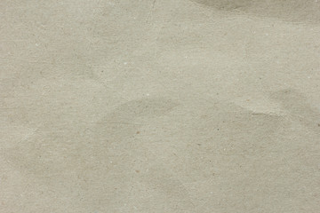 Texture of old grey crumpled paper cardboard for background