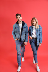 Fototapeta premium Full length portrait of a smiling young couple