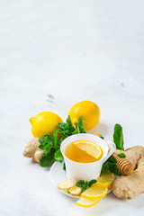 Ginger tea in a cup for flu cold winter days