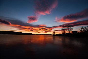 beautiful sunset at the frozen lake