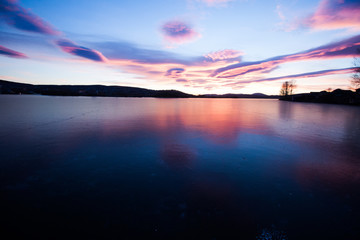 beautiful sunset at the frozen lake