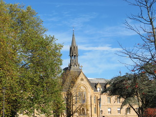 Senior home in luxembourg, chapel tower neo gothic style, autumn sunshine