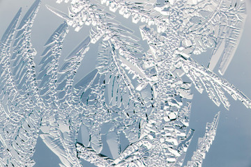 Snow patterns on glass as an abstract background