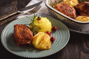 Roasted duck breast with apples and cranberries.