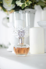 Beautiful perfume bottle Aroma of women's perfume. Caramel colored
