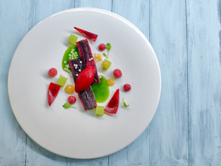 Salmon strips with raspberry icecream