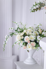 Wedding bouquet of white roses in a vase. Wedding decorations. White Rose.