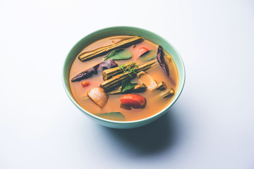 Drumstick Curry or Shevga sheng bhaji or south indian Sambar, served in a bowl over moody...