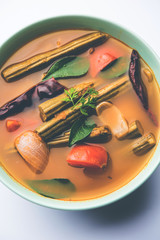 Drumstick Curry or Shevga sheng bhaji or south indian Sambar, served in a bowl over moody...