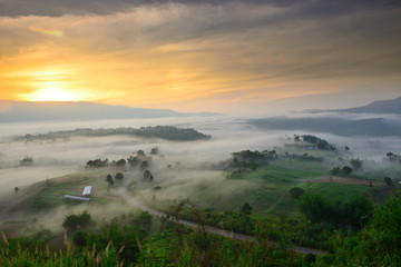 Beautiful scenery of the mist in the mountains at sunrise. Beautiful scenery of the mountain at sunrise in northern Thailand.