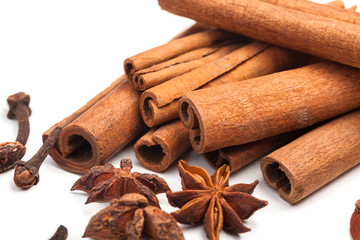 Cinnamon sticks and star anise isolated on white background