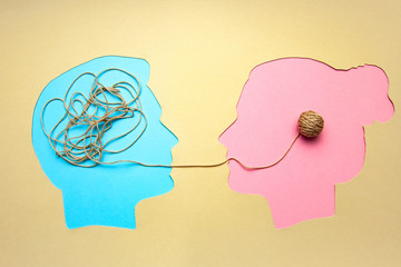 Two people communicate face to face, man and woman. Concept decoding and understanding problem or...