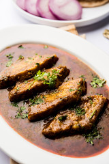 Patodi Rassa Bhaji or patwadi Sabji, a popular Maharashtrian spicy recipe served with Chapati and salad. Selective focus