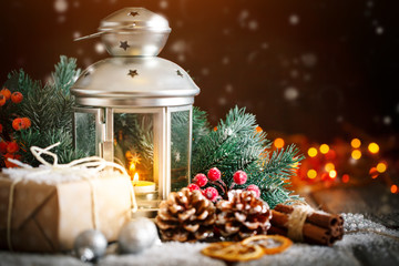 Merry Christmas and happy New year. Christmas gift and Christmas tree on dark wooden background. Selective focus.