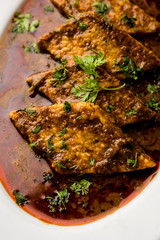 Patodi Rassa Bhaji or patwadi Sabji, a popular Maharashtrian spicy recipe served with Chapati and salad. Selective focus