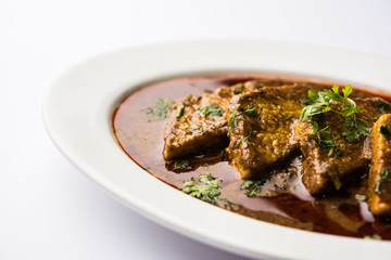 Patodi Rassa Bhaji or patwadi Sabji, a popular Maharashtrian spicy recipe served with Chapati and salad. Selective focus